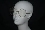 big round metal clear cleans glasses